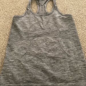 Preowned Lululemon swiftly tank , size 8, Grey